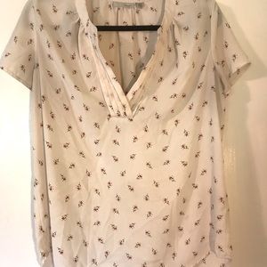 Blouse with pleated neckline and small flower print